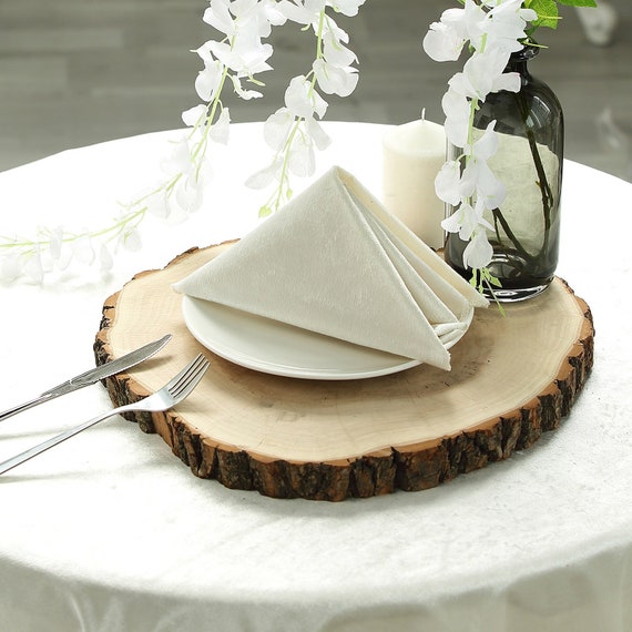 12 inch wood slices for wedding centerpieces, chargers, or other decor •  Offbeat Wed (was Offbeat Bride)