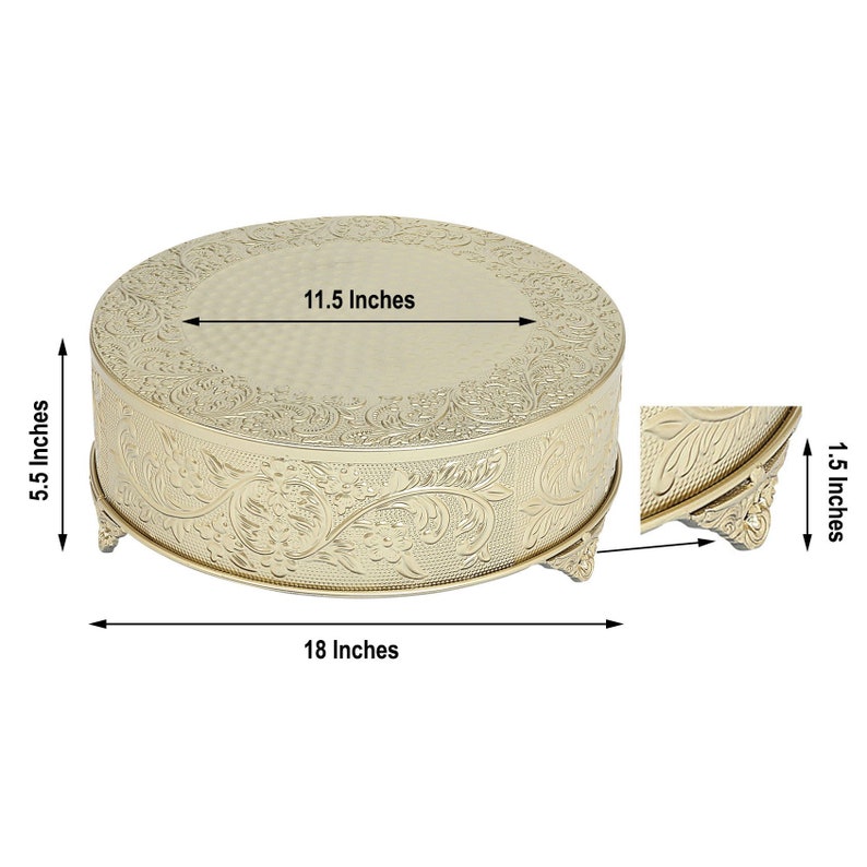 May include: Gold round cake stand with an ornate design. The stand measures 18 inches in diameter, 11.5 inches across the top, and 5.5 inches tall.