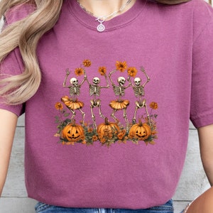 Comfort Colors Dancing Skeleton Shirt, Floral Skeleton Tee, Funny Halloween Shirt, Fall Party Tee, Spooky Season Skeleton Gift.
Halloween shirt
Skeleton fall shirt
Spooky Season
Womens Halloween tee
Skeleton tee Women
Dancing Skeleton
skeleton costume
funny skeleton dance
dance skeleton tee
floral skeleton
Skeleton shirt
Skeleton halloween
flower skeleton tee