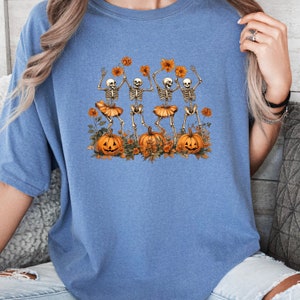 Comfort Colors Dancing Skeleton Shirt, Floral Skeleton Tee, Funny Halloween Shirt, Fall Party Tee, Spooky Season Skeleton Gift.
Halloween shirt
Skeleton fall shirt
Spooky Season
Womens Halloween tee
Skeleton tee Women
Dancing Skeleton
skeleton costume
funny skeleton dance
dance skeleton tee
floral skeleton
Skeleton shirt
Skeleton halloween
flower skeleton tee