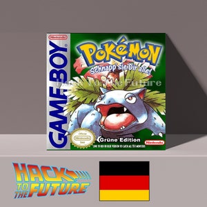 Könnte beinhalten: Eine grüne Game Boy-Cartridge für das Videospiel Pokemon. Die Cartridge zeigt eine blaue und weiße Illustration eines Pokemon-Charakters mit dem Text "Pokemon" und "Schnapp sie Dir alle!" in Deutsch. Der Text "Grüne Edition" ist ebenfalls auf der Cartridge zu sehen.