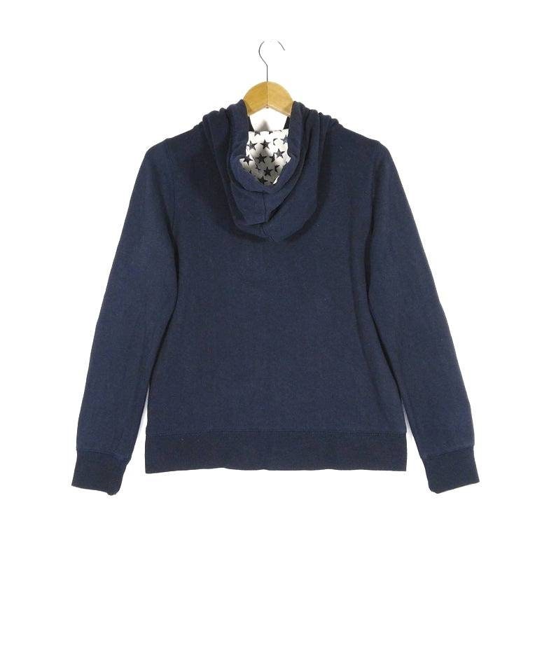 May include: A navy blue zip-up hoodie with a star-patterned hood lining.