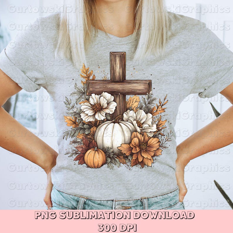 May include: A light gray t-shirt featuring a cross design with a white pumpkin, flowers, and fall foliage. The cross is brown, and the flowers are white and orange. The text "PNG SUBLIMATION DOWNLOAD" and "300 DPI" is at the bottom.