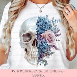 May include: White t-shirt with a skull design on the left and a floral arrangement on the right. The floral arrangement includes blue hydrangeas, a pink rose, and lavender. Text at the bottom reads "PNG SUBLIMATION DOWNLOAD" and "300 DPI".