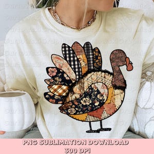 May include: A cream-coloured sweatshirt with a patchwork turkey design. The turkey features various patterns and colours, including floral and plaid prints. The text "PNG SUBLIMATION DOWNLOAD 300 DPI" is at the bottom.