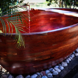 Wooden bathtub. Rosewood. Outdoors. Bath caddy included image 1