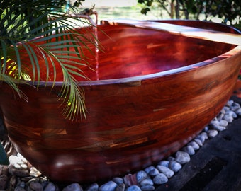 Wooden bathtub. Rosewood. Outdoors. Bath caddy included