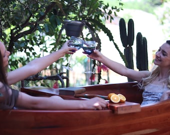 Wooden bathtub made from Rosewood.