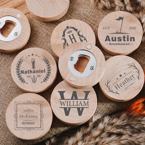 May include: Set of eight round wooden bottle openers with engraved names and designs. The designs include a golf club, a beer glass, a monogram, and a wreath.