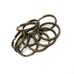 Antique Brass-Plated Steel Split Rings - 28mm round with 24mm inside diameter Pack of 100