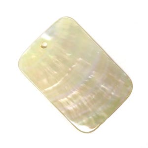 May include: A rectangular, iridescent white mother of pearl shell with a hole drilled in the top. The shell has a smooth, polished surface and a natural, organic pattern.