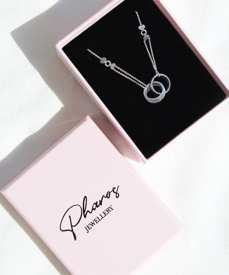 Pharos Rings Sterling Silver Double Ring Necklace: Cubic Zirconia Pave Set, Eternity ...
