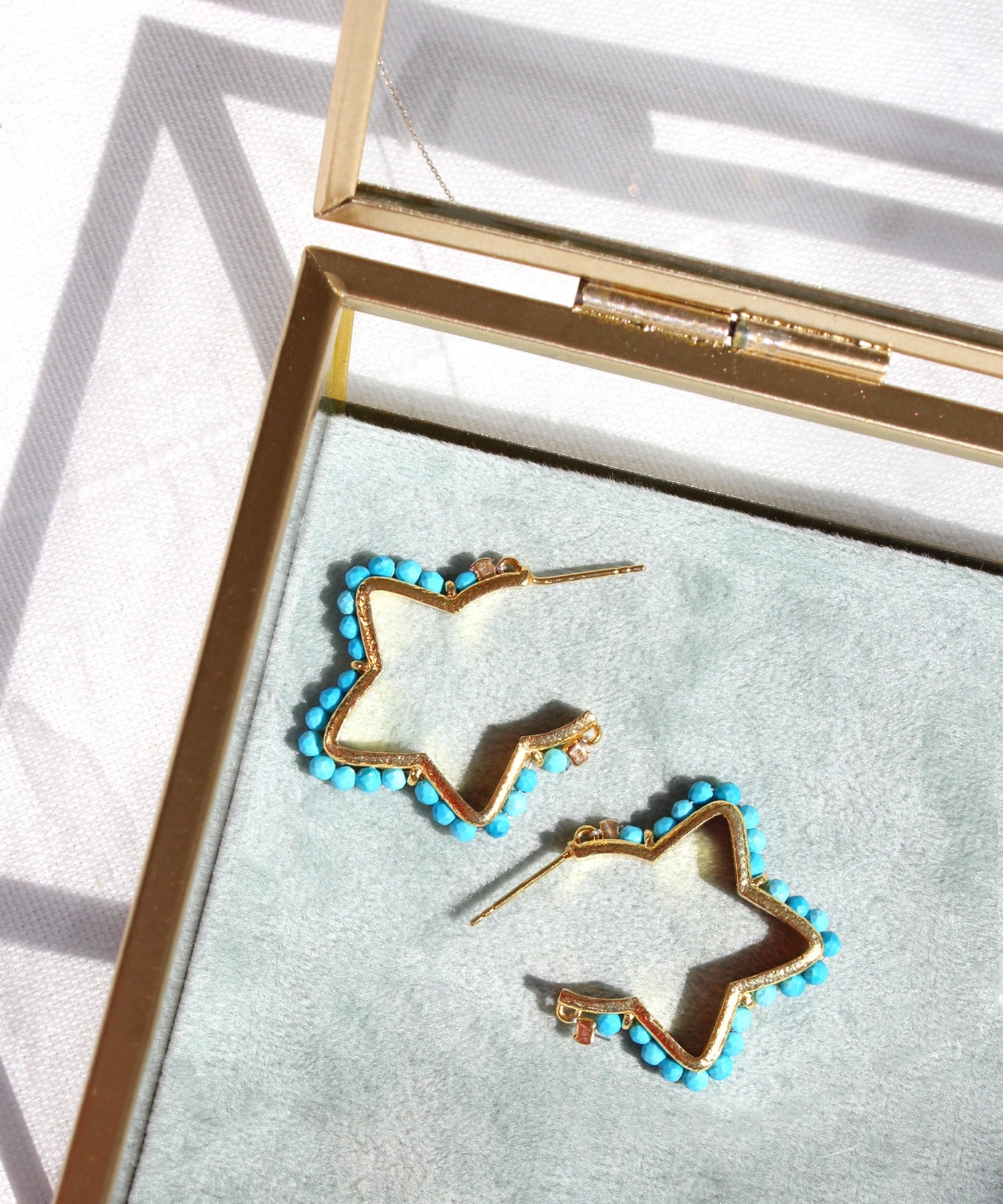Orecchini a Cerchio con Stella in Argento Sterling 925 per