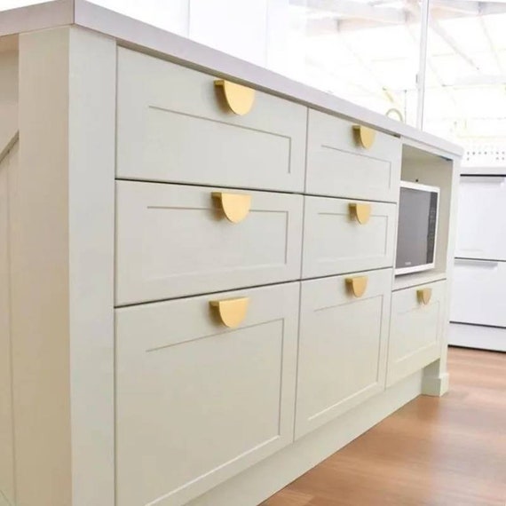 A French Mid-Century Three Drawer Chest with Circular Pulls A French Mid-Century Three Drawer Chest with Circular Pulls
