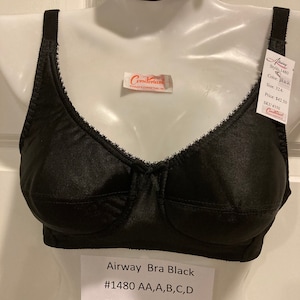 May include: Black Airway bra with fiberfill lined cups, displayed on a mannequin. The bra has adjustable straps and a delicate lace trim along the top edge of the cups. The tag reads "Corsetorium" and lists the style, size, and color.