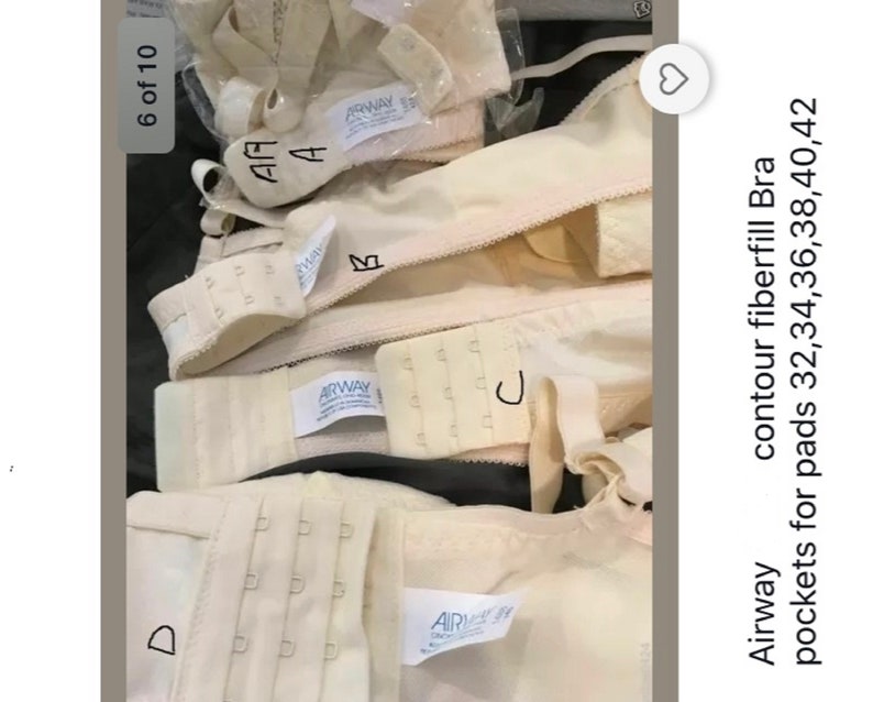May include: A collection of beige contour fiberfill bras with pockets for pads. Various bra parts are shown, such as straps, hooks, and labels. The text "Airway" is visible on some labels. Sizes 32, 34, 36, 38, 40, and 42 are listed.