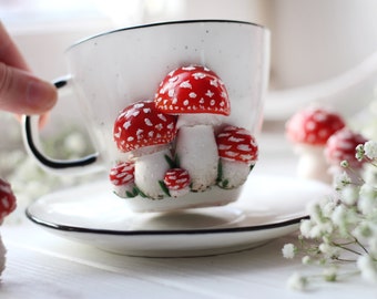 Teacup and saucer with mushroom, handmade ceramic cottagecore cup