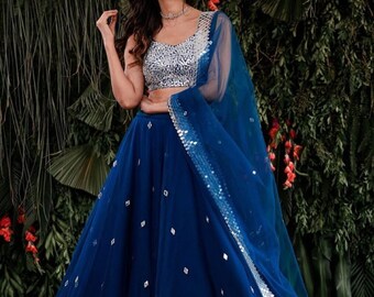 black blouse and blue lehenga