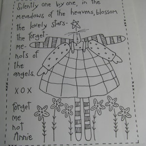 May include: A white paper embroidery pattern titled By My Hand featuring a black line drawing of an angel with a star above its head, wearing a plaid dress and striped legs, surrounded by flowers and text reading Silently one by one, in the meadows of the heavens, blossom the lovely stars- the forget-me-nots of the angels. XOX forget me not Annie. Forget Me Not Annie - pattern for an 11" x 14" embroidered picture.
