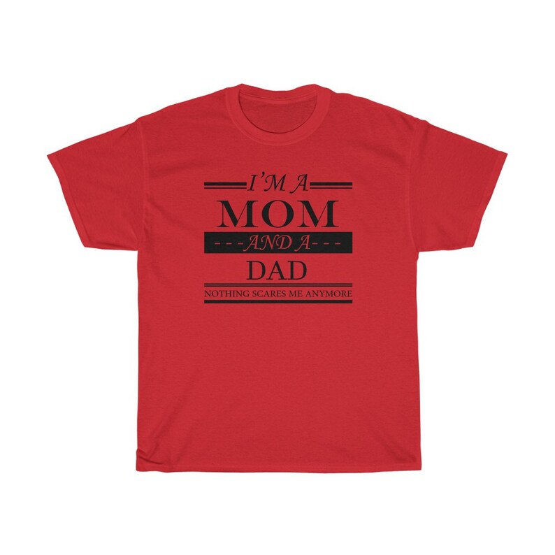 May include: Red t-shirt with black text that reads "I'm a Mom and a Dad. Nothing scares me anymore."