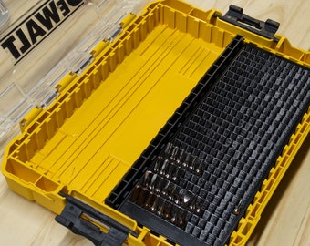 May include: Yellow and black DeWalt tool case with a clear lid. The case is open, revealing a black insert filled with various metal drill bits. The DeWalt logo is printed in black on the clear lid.