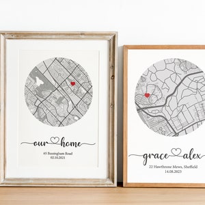 May include: Two framed prints with maps of different locations. The first print says "our home" with a red heart and the address "65 Rustingham Road, 02.10.2021". The second print says "grace alex" with a red heart and the address "22 Hawthorne Mews, Sheffield, 14.08.2023".