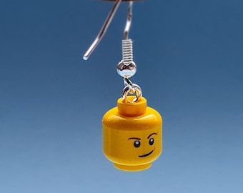 Boucles d’oreilles de tête de figurine Lego