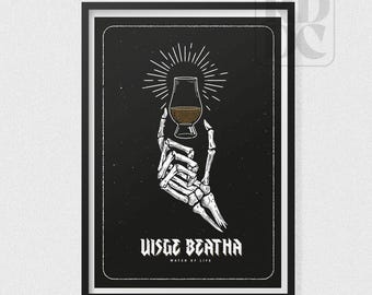 May include: A black and white illustration of a skeletal hand holding a glass of whiskey. The text "uisge beatha" is written below the glass, with the words "water of life" in smaller font underneath.