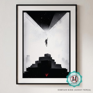 May include: A framed black and white art print featuring a silhouette of a person reaching upward toward a bright light above a stepped pyramid structure. The composition includes a small red triangle at the base and text reading BRYAN KIRK GEEKY NINJA.