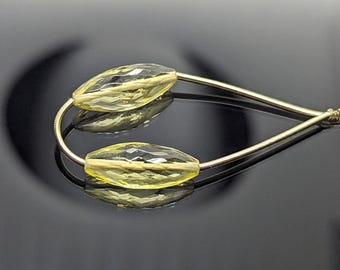 AAA+ citroenkwarts microfacetten dholki-kralen: paar, maat 6,5 x 15,5 mm en 6,6 x 15,7 mm