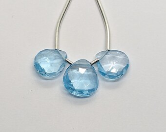 Hemelsblauwe topaas gefacetteerde hartbrioletten: set van 3, afmetingen 8,2 x 8,7 x 3 mm tot 8,6 x 9,6 x 3,5 mm