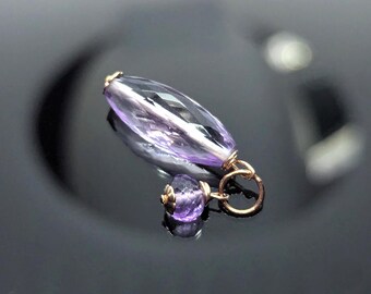 Colgante de amatista rosa y lavanda en oro rosa de 14 quilates.