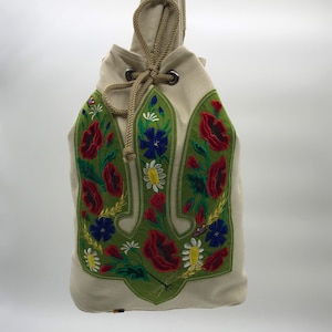Ukrainian backpack with an embroidered trident.
