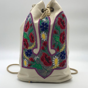 Ukrainian linen backpack with a trident