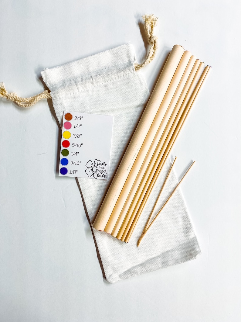 May include: A set of 10 natural bamboo skewers in a white drawstring bag. The skewers are various lengths, ranging from 1/8 inch to 3/4 inch. A color chart is included to show the different sizes.