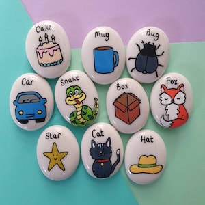 Rhyming words handpainted pebbles. Story stones.  Eyfs