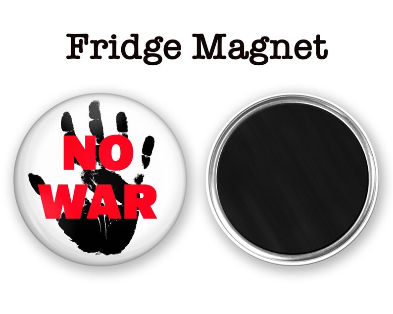 May include: A white round fridge magnet with a black handprint and the words "NO WAR" in red letters.