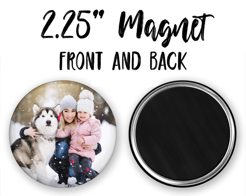 May include: A 2.25 inch round magnet with a photo of a woman and a child holding a dog in the snow. The back of the magnet is black.
