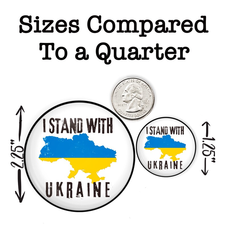 May include: Two round buttons with the text "I Stand With Ukraine" and a blue and yellow outline of the country of Ukraine. The larger button is 2.25 inches in diameter and the smaller button is 1.25 inches in diameter. A US quarter is shown for size comparison.
