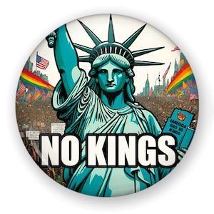 May include: A round button featuring the Statue of Liberty in teal and white, with the text "NO KINGS" in bold white letters. The background shows a crowd with rainbow flags and American flags.
