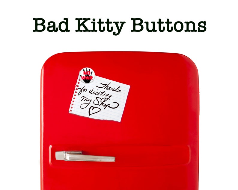 May include: A red refrigerator with a white note that says "Thanks for visiting my shop" and a red and black button that says "No War" on it.