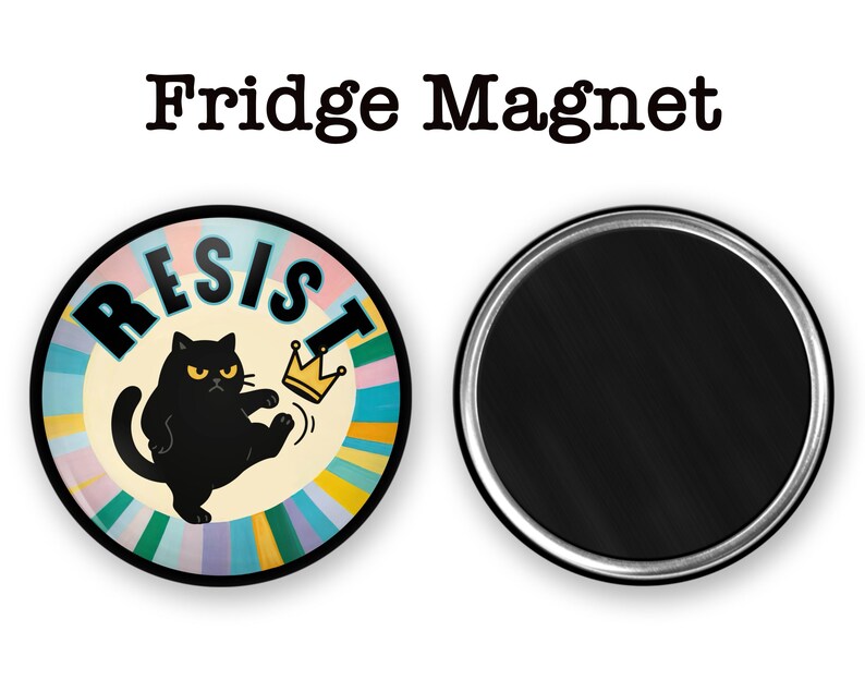 May include: A round fridge magnet with a black cat illustration kicking a gold crown. The word "RESIST" is in large letters. The magnet has a colorful striped background and the text "Fridge Magnet" at the top.