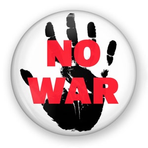 May include: A white button with a black handprint and the words "NO WAR" in red letters.