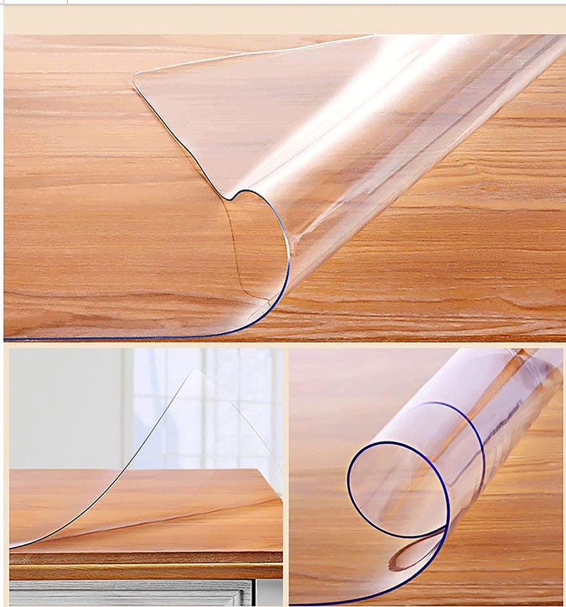May include: Clear plastic table protector, rolled up to show its thickness and flexibility. The protector is designed to protect table surfaces from scratches and spills.
