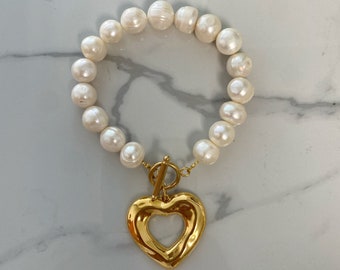 Large heart charm bracelet, gold tone heart charm  bracelet, big pearl  bracelet .Fresh pearl rifle bracelet with gold tone heart