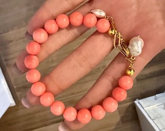 Pink tone coral bracelet
