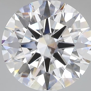 May include: A round-cut diamond with numerous facets, reflecting light. The diamond's center features a star-like pattern, surrounded by triangular and rectangular shapes. The overall appearance is clear and brilliant, showcasing the gem's sparkle.