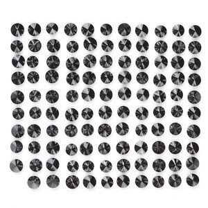 May include: A sheet of black diamond-shaped rhinestones, arranged in a grid pattern.