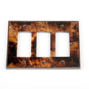 Switch Plate, Triple Rocker, Tiger Penshell inlaid on Dark Bronze frame.