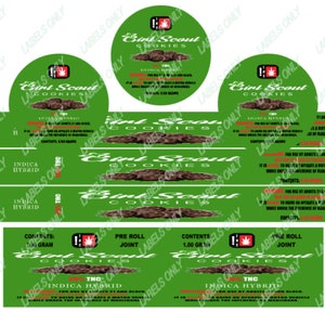 May include: Green and white label with the text "Girl Scout Cookies" and an image of chocolate chip cookies. The label also includes the text "Indica Hybrid" and "THC".
